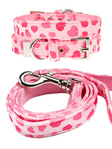 Pink Hearts Fabric Collar & Lead Set - This Pink Hearts collar and lead set is a perfect girly accessory. It is a contemporary style and the pattern is on trend. It is lightweight and incredibly strong. The collar has been finished with chrome detailing including the eyelets and tip of the collar. A matching lead, harness and bandana are...
